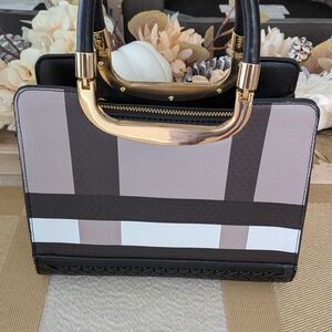 Elegant Black and Gold Handbag